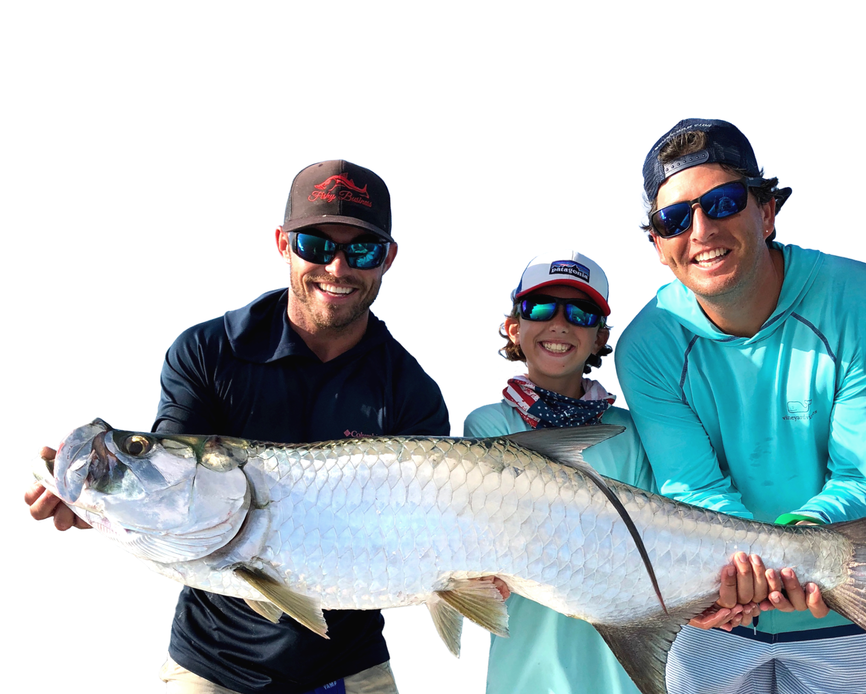 Captain Drew with male child and adult male posing with fish