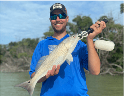 Man holding a Tarpon